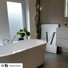 Indeed, the bathtub — which doesn't seem to be a bathtub at all — is accessed via a small staircase that's next to shelves full of girls gone wild dvds. Pin On Baderom Bathrooms