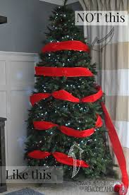 How To Decorate A Christmas Tree Like A Professional Remodelaholic Sawdust2stitch Christmas Tree Decorations Ribbon On Christmas Tree Christmas Decorations