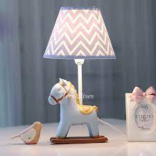 For cooler light, consider light blue, green or silver shades, and for more neutral tones, choose a minimalist cream, white, or tan shade. Designer Kids Lamps Fabric Resin Bedside Modern Reading Small