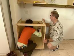 Measure 1⁄2 in (1.3 cm) in from the front of the cabinets. How To Install Wall And Base Kitchen Cabinets How Tos Diy