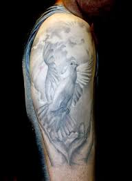 Tribal chest and arm tattoo. 50 Dove Tattoos For Men Soaring Designs With Harmony