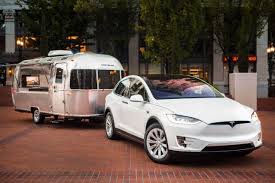 Tesla An Airstream If You Can Order From A Food Truck You Can Order One Of Elon Musk S Cars A Mobile Airstream Design Studio Tesla Motors Tesla Airstream
