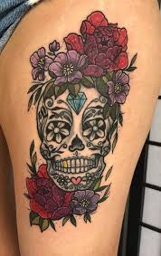 Skull tattoo on front side shoulder. 100 Unique Sugar Skull Tattoos Designs Ideas Tattoo Me Now