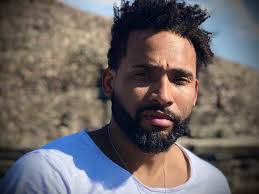 FOUR SCREENS MANAGEMENT SIGNS AWARD WINNING DIRECTOR ABDUL MALIK ABBOTT