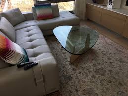 It is reminiscent of his bronze and marble sculptures of the time, beautifully transformed into a piece of sculptural furniture. Matching Side Table For Noguchi Coffee Table In White Ash