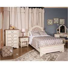 In a beautifully distressed whitewashed finish, you'll love dreaming away in casual style. B743 87 Ashley Furniture Realyn Full Upholstered Panel Bed