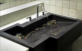 asymmetrical black concrete custom bath