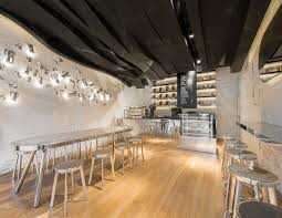 Cafe young people characters dinning and working in modern coffehouse. 12 Of Our Favorite Modern Coffee Shop Designs Around The World Architectural Digest
