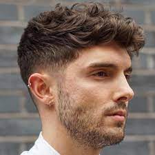 Dark Blonde Curly Taper Fade Haircuts For Guys Men Haircut Curly Hair Mens Haircuts Fade Faded Hair