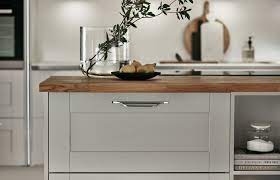 The tolix bar stools are from antiquaire and the large pendant candy shop light, made from industrial parts, is by john ogden from john derion. Decorative Handle Detailing In Our Burford Grained Light Grey Ktichen Part Of The Shaker Collection By Light Grey Kitchens Kitchen Interior Kitchen Suppliers