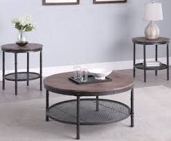 The legs' bases are finished in cherry with a silver finish on the top. Coaster Weathered Brown And Black 3 Piece Round Occasional Set 735984 Weathers