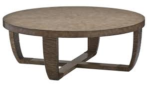 Dark brown medium round wood coffee table with smooth top. Round Wooden Coffee Table From Our Modern Dakota Collection
