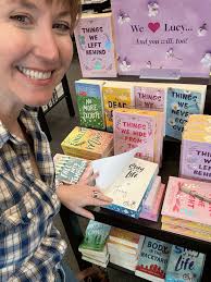 Happy sunny Sunday! I popped into the Books-A-Million in York, PA and  signed all the Lucy books they had… including this whole adorable table  display! Happy reading, friends 😍 [Image description: A