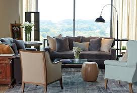 The sectional has one end table on one side. Living Room Two Chairs Novocom Top