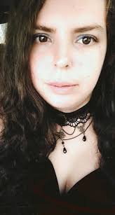 Got me a little black dress to match my choker and bracelet.