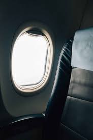 The Perils Of Traveling While Plus Size The Crunchy Mommy Travel Bags For Women Plane Window Editing Background