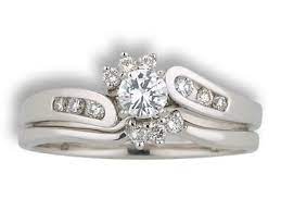 Elegant Engagement Ring Cradled By Diamond Wedding Band On Both Sides So Unique Diamond Wedding Bands Elegant Engagement Rings Engagement Rings