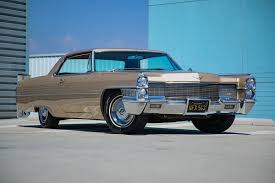 Image result for Claret Maroon 1965 Cadillac