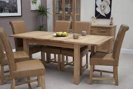 Oak kitchen and dining chairs have subtle grain patterns and can have two different casts. Homestyle Opus Light Oak Extending Dining Table From The Bed Station