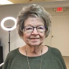 What can be used to protect a 6-month-old Yorkie puppy's surgery site after  neutering?