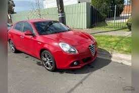 Image result for Rosso Giulietta 2012 Alfa-Romeo