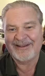 Bobby Mathis, a relative of Hyman Jr.'s wife, in shed 9 breakroom at Hyman  Young Greenhouses.