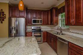 Among other options, typhoon bordeaux granite with cherry cabinets is an ideal addition to your kitchen space because you simply cannot go wrong if you choose it. Granite On Cherry Cabinet Houzz