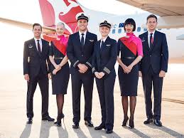 For Qantas Australia S Own Martin Grant A Past Favorite Of Both Tilda Swinton And Lady Gaga Opted Flight Attendant Uniform Airline Uniforms Flights To London