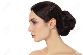 Long hair is a gift from god, and we should make sure it the low hanging bun is a perfect hairstyle for indian women whose hair is so long that they feel. Profile Portrait Of Young Beautiful Woman With Stylish Hair Bun Stock Photo Picture And Royalty Free Image Image 41208833