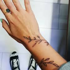 Leaf shapes were first cut from cardboard then attached to pieces of wire. Wrist Wrap Around Wrist Vine Tattoos Novocom Top