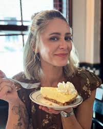 Top Chef and TOC winner Chef Brooke Willamson about to enjoy Florida's gift  to the culinary world, a slice of key lime pie, at The Food Network South  Beach Wine and Food