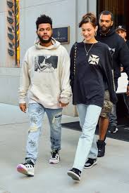 Bella hadid and the weeknd are hanging out again. Bella Hadid And The Weeknd Have A Couples Style Moment In Rhude Vogue