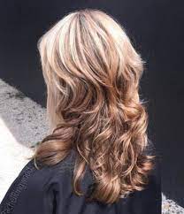 This Long Shag Curly Hairstyle Combines A Look Of Straight Hair Up Top And More Expressive Curls Through Th Long Shag Hairstyles Long Shag Haircut Shag Haircut