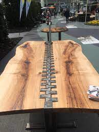 There is mosaic build into it. Cherry Pick Live Edge Table Purple Cherry Architects