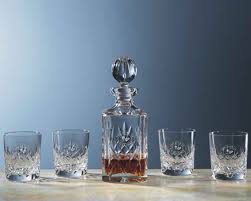 Both the decanter and the glasses are custom engraved with designs according to your choice. Personalized Engraved Crystal Decanters And Carafes