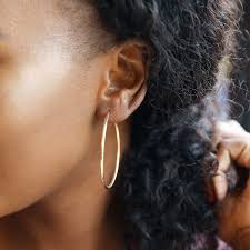 Maybe you would like to learn more about one of these? Medium Gold Sterling Silver 50mm Hoop Earrings