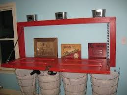 It Might Seem Nuts At First But It S Actually Brilliant To Hang Your Door Like This Laundry Folding Laundry Folding Tables Laundry Room Makeover Upcycle Door