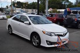 Is the 2014 toyota camry an incredibly smart buy, or simply a default choice in the family sedan market? 2014 Toyota Camry Sport