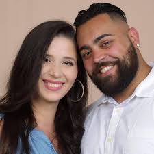 Painful moment dad-to-be fractures ankle kicking football filled with  coloured paint at gender reveal party