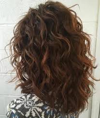 To achieve this frizzy look and perfect curls for a long curly hairstyle, nourish your spirals with special oil. 60 Most Magnetizing Hairstyles For Thick Wavy Hair