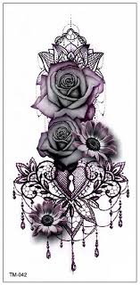 Whatever it lacks in colour, it brings out in its intricate detail and image: Gothic Rose Mandala Chandelier Back Tattoo Ideas For Women Traditional Vintage Cool Unique Geom Lace Tattoo Tattoo Designs For Women Sleeve Tattoos For Women