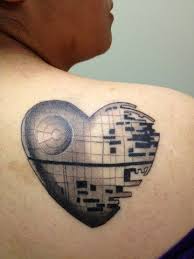 C o m wondering if maybe you could come up with maybe a swirl or heart or something in the middle of a star. Unique Designed Black Ink On Shoulder Tattoo Of Heart Shaped Death Star Tattooimages Biz