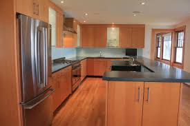 Modern Kitchen With Douglas Fir Veneer Concrete Counter Tops And Glass Subway Tile Backspla Kitchen Countertops Kitchen Island Countertop Kitchen Inspirations