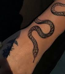 Depending on your cultural reference point, snake tattoos can symbolize a variety of characteristics and meanings. Snake Tattoo Images On Favim Com