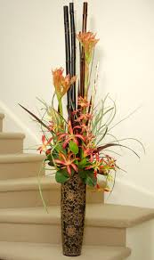 Pull away any excessive leaves from the stems you choose, and drop them in the bud vases. Glenelg Bay Junction Florist
