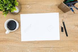 Blank Paper On The Business Desk Table. Top View, Flat Lay, Stock Photo,  Picture and Royalty Free Image. Image 98551580.
