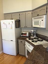 Goodbye Oak Cabinets Hello Grey Cabinets Paint Sherwin Williams Pewter Tankard Painted Kitchen Cabinets Colors Painting Oak Cabinets White Taupe Kitchen