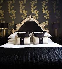 Luxury Black And Gold Bedroom Furniture Black Gold Luxury Bedroom But Imagine The Leaves Pattern In Mauve Burgundy Bedroom Decor Design Black Gold Bedroom Luxurious Bedrooms