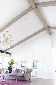 I really love the rustic post and lintel look of barn wood beams in a doorway. The Result Of My Diy Faux Wood Beams Classy Clutter