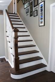 White risers on wooden stairs can help to brighten a narrow or poorly lit stairway. Staircase Makeover Redo Stairs Staircase Makeover House Stairs